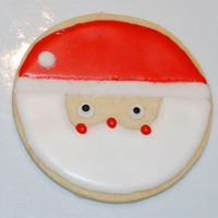 Santa Cookie I got this cookie design from the book Cookie Craft by Valerie Peterson & Janice Fryer. I also sprinkled white sugar on the brim of the...