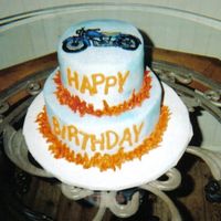 Motorcycle Cake Motorcycle is BCT. The cake is iced with buttercream, airbrushed and piped flames.