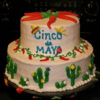 Cinco De Mayo Cake for fun to put in the teacher's lounge for Cinco de Mayo. 8" top layer, choc. w/raspberry; 12" bottom, vanilla w/...