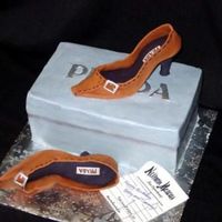 Prada Shoes Shoes are hand-molded with sugarpaste. The box is a buttercream iced cake.