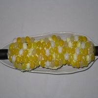 Corn On The Cob Cupcakes From the Hello Cupcake! cookbook. Used yellow/white jelly bellies and added my own corn holders on ends.