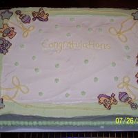 100_2364.jpg BC Icing. Figures in corners are chocolate tranfers from the napkin for the shower