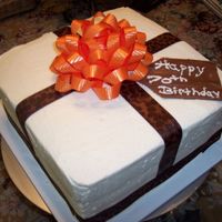 Present Cake My grandma's birthday cake. BC, real ribbon & bow and chocolate tag.