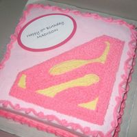 Supergirl Cake Supergirl cake inspired by Cambo for a friend's daughter's birthday. I made 2 identical cakes -- one for her and one for her twin...