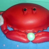 Close-Up Of Cancer Crab W/ Pearl This is a close-up of the crab (devil's food w/choc.buttercream covered in mmf). He was for a Zodiac b-day cake (Cancer). He's...