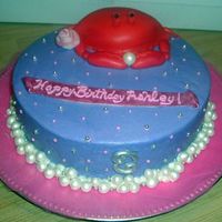 Cancer The Crab 12" round devil's food w/ vanilla buttercream and a devil's food crab iced in choc.buttercream-covered in mmf. Some pearls...