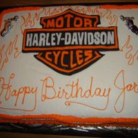 Harley Davidson Birthday Cake I made this for my son's 24th birthday. It was my first real experience with fondant (logo is fondant)He loved it!