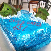Rich's Fish Chocolate and vanilla cake, with chocolate ganache filling. Fish was made of RKT and covered in fondant.