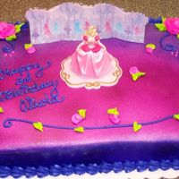 Barbie A chocolate and yellow Barbie cake.