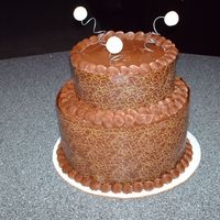 Chocolate_Transfer.jpg This was my first attempt at a stacked chocolate transfer. It is a bit wobbly but my daughter liked it.