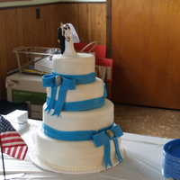 Wedding Cake 4 tier wedding cake decorated in bc frosting with mm fondant over the top. MM bows there are some obvious mistakes in here, however when...