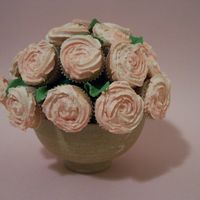 Peach Cupcake Bouquet I made this for my sons pre-school teacher who was leaving to go to another job.