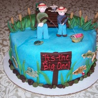 Fishing Birthday Cake Cake I made for my Father In Laws 50th. It is supposed to be him fishing with my son, something they love to do.