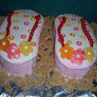 Spring Flower Flip Flops BC frosting, licorice string braided straps, and fruit tootsie roll flowers. I have never used fondant yet and for something so small I...
