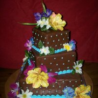 Chocolate Wedding covered in choco-pan. flowers are silk