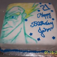 Drogon Ball Z- Gouku 2 layer sponge cake w/ MMF and buttercream accents. My son drew the Gouku pix with edible food writers.