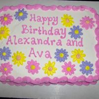 Picture_147.jpg This was a cake I did for my sister's neighbor's daughters. I thought it was fun to make all those daisies.