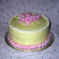 Easter06.jpg Simple cake I made for Easter this year. Its french vanilla with strawberry dreamwhip filling and BC icing.