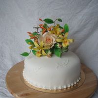 A Bithday Cake To Myself Gumpaste flowers; a rose, watsonia and vanilla orchids.