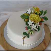 Easter Cake. With rose, daffodil, stephanotis and kumquats.