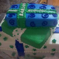 Stacked Presents this is 2 9x13's, one is cut to make the top two presents. I enjoyed making this cake!