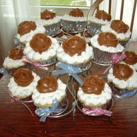 Cupcakes For Salima's Shower just vanilla cupcakes, vanilla frosting and chocolate cream cheese roses