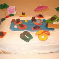 Beach/pool Cake I used Teddy Grahams, Air Heads, Gummy O-Rings. I used Wilton icing markers to draw bathing suits on the bears.