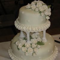 Greenish Wedding Cake I made this for an anniversary party. It is chocolate cake with mint frosting. It is covered with fondant and the roses are make from...