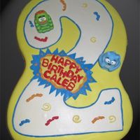 Yo Gabba Gabba Carved from a sheet cake covered mmf. Characters are little toys