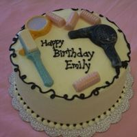 Beautyshop This cake was made for a girl going to cosmetology school. The accesories were made with a chocolate mold.