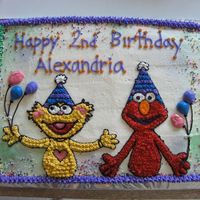 Elmo Half choc and vanilla sheet cake. Used piping gel for the character outlines. All BC