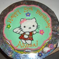 Hello Kitty Made this cake for my friends daughter. Chocolate cake with strawberry filling. BC frosting. Outlined design on paper with piping gel,...