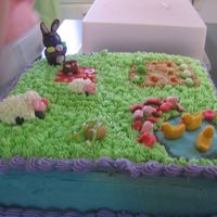Another Easter Cake Choc cake, cc icing, fondant critters and candy clay rabbit.. cake didn't transport well( sides alittle messed up) but my extended...