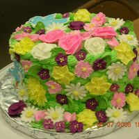 Graduation Cake This is the Course II grad. cake. I wish I had made the flowers cascade down but I didn't really know how to do it. I really liked...