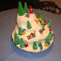 Mountain With Snowboarding & Skiing the people are made of melted chocolate; boards & skis are gum; trees are ice cream cones upside down;