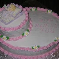 Baptism Cake I made this cake for my god daughters baptism. It didn't turn out exactly the way I wanted but everyone liked it.