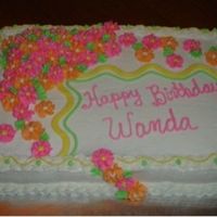 Bright Flowers I did this birthday cake for a friend of a friend's birthday. She told me that she loved icing, so I loaded it down with mounds...