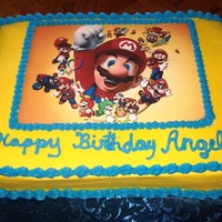 Super Mario Super Mario edible image, yellow/chocolate marble cake, buttercream frosting