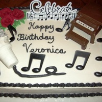 Music Theme My niece wanted something with a piano, microphone and music notes. This is what I came up with. Strawberry cake, buttercream, chocolate...
