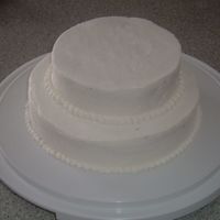 Plain White Cake I started baking this cake for a fundraiser, and at the last minute it was canceled, so i just slapped this together, nothing fancy, butter...