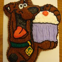 Scooby Doo Cake I made this cake to go along with the Scooby Doo cupcakes that I made for my BFF's daughter's birthday party. It is chocolate...