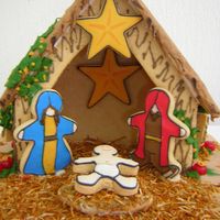 Nacimiento Hecho con masa de galleta de mantequila, decorado con coco y dulces, es perfecto para la Navidad