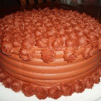 Yummy Triple Fudge Birthday Cake Triple Fudge Cake with Raspberry filling and Chocolate Buttercream Frosting. This cake was for a man so I didnt want to decorate with...