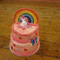 Unicorn Birthday Cake A very pink cake for my daughters 6th birthday. She loves unicorns so I themed the cake on Unicorn Magic napkins (a unicorn and a rainbow...