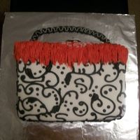 Purse Cake This is only my 2nd purse cake to do. Sorry you can't see the top very well. It is a french vanilla cake with strawberry filling. All...