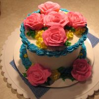 Birthday Cake Roses 6inch, 2 layer white cake, all BC ...this is a smash cake for a 1st bday. She wanted bright colors and roses. Also made identical 2 layer...