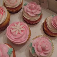 Cupcakes! white chocolate and strawberry cupcakes with bc icing for bday party....went with smash cake