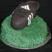 Soccer Cleat Made this for our end of season soccer party. The cleat is chocolate cake with IMBC and covered in fondant.