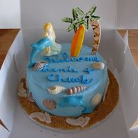 Welcome Cake For Out Of Town Guests Buttercream icing, chocolate and fondant accents