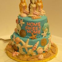 Housewarming Beach condo housewarming, BC frosting, chocolate mold accents.